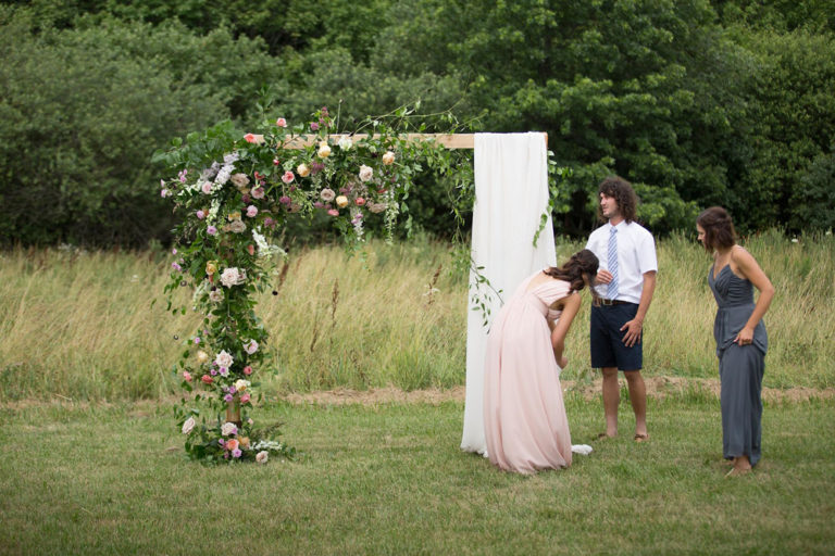The ceremony arch in the meadow