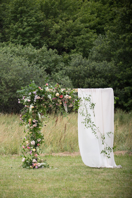 Flowers on the ceremony arch