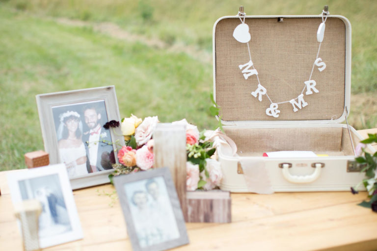 The welcome table with framed family photos