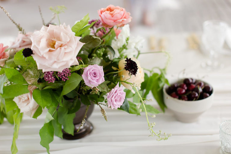 Table flowers and cherries