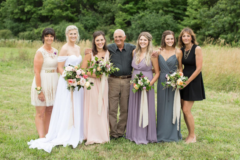 The bride with family in the field