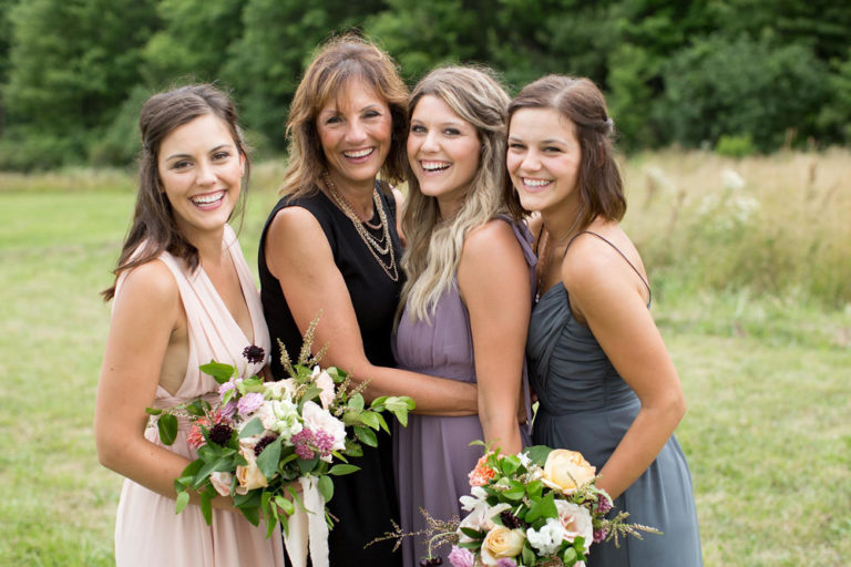 Bridesmaids hugging