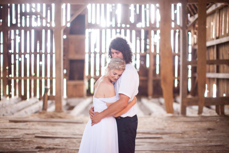The couple in the old timber barn