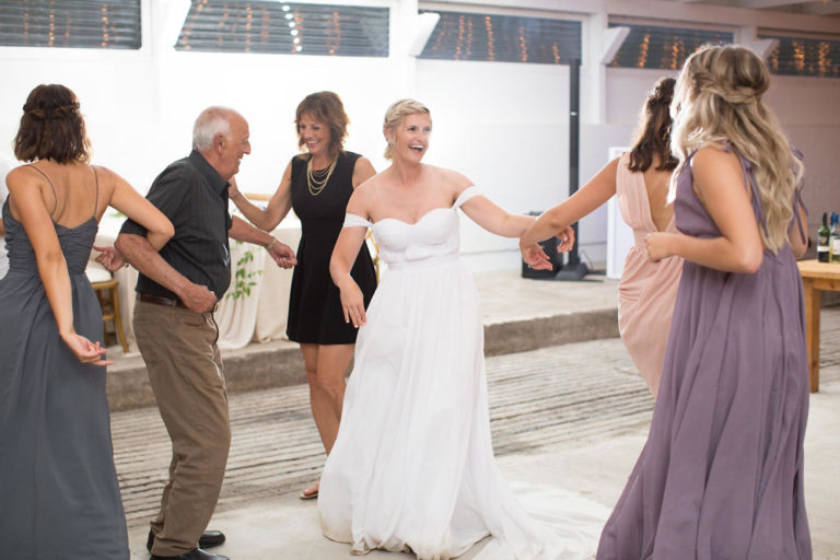 The bride dancing with guests