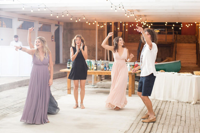 Guests dancing in the barn
